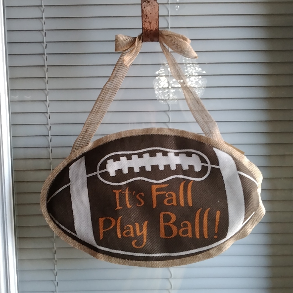 A fall burlap door hanger
